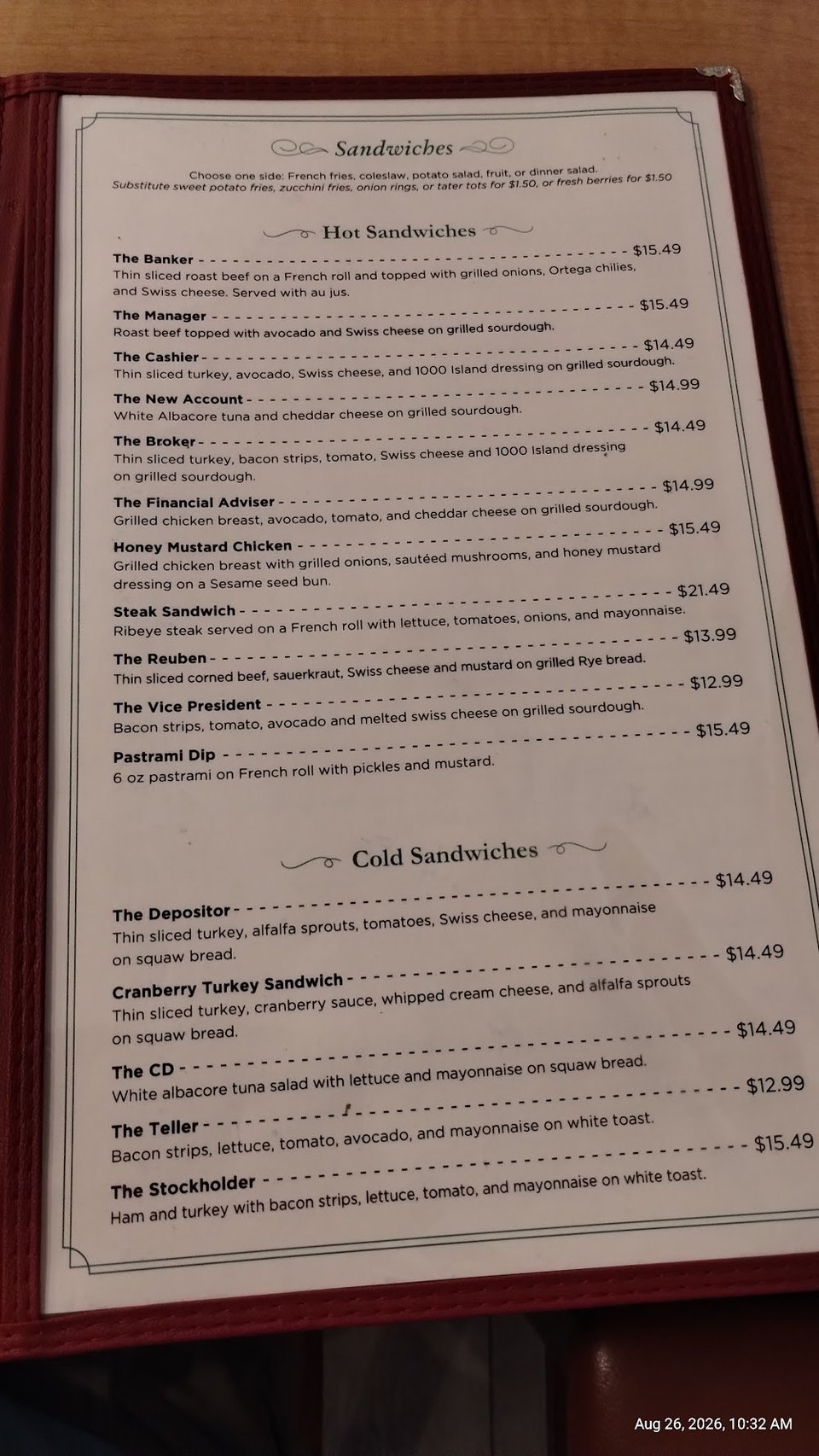 Printed menu page beside a coffee cup